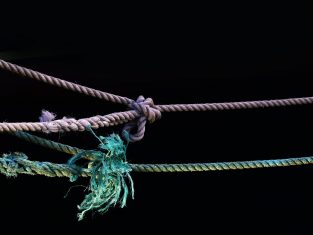 Merging strings in JavaScript tutorial feature image