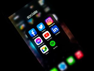 Social media logos displayed on phone