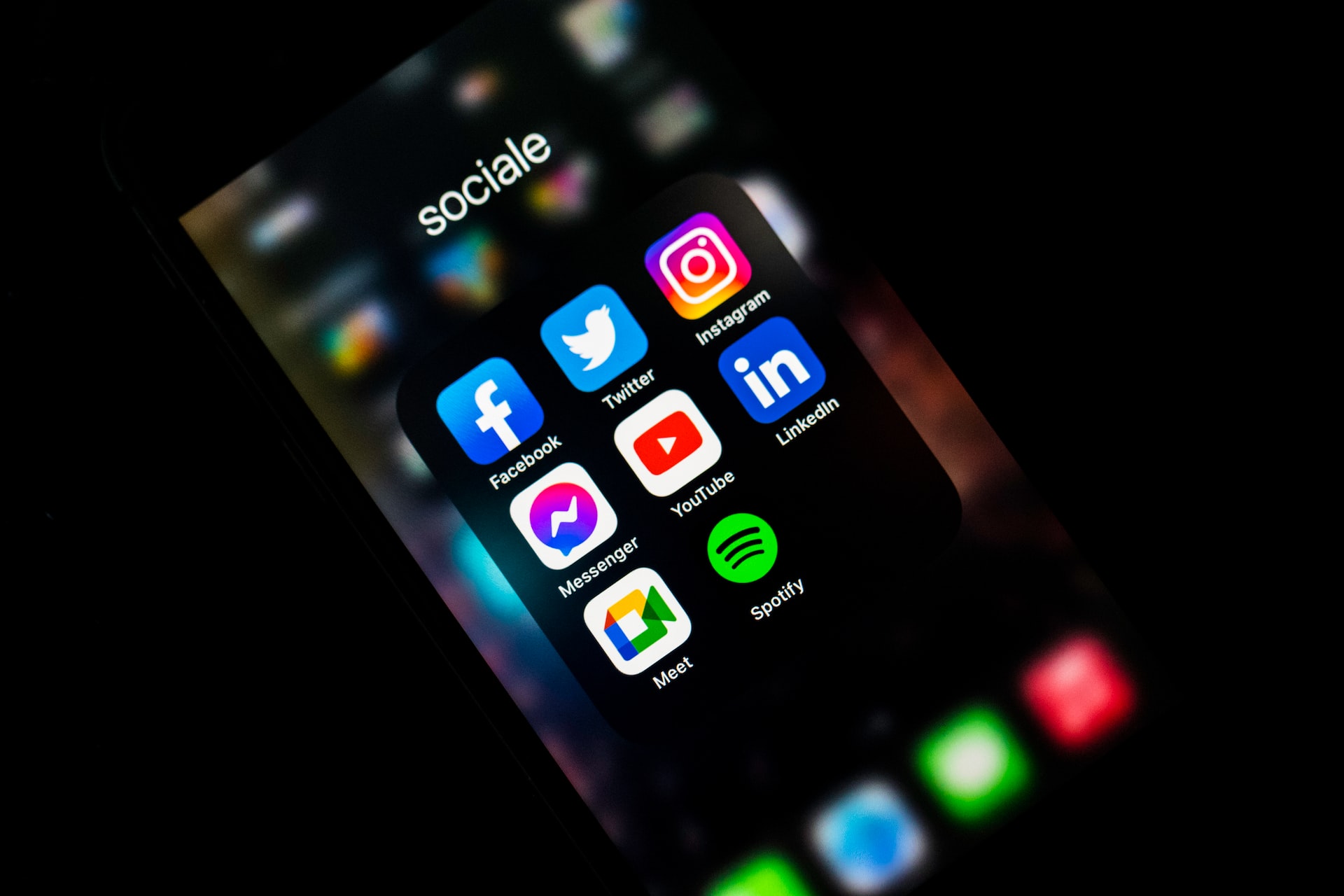Social media logos displayed on phone